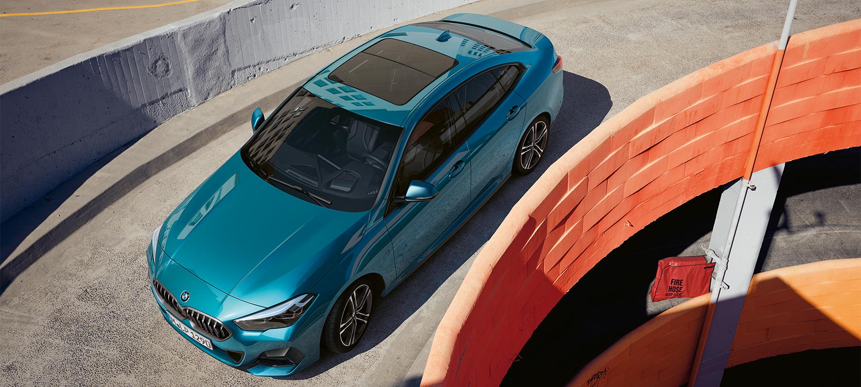 BMW 2 Series Gran Coupé with Panorama glass roof BMW 2 Series Gran Coupé with Panorama glass roof Snapper Rocks Blue metallic F44 bird's-eye view